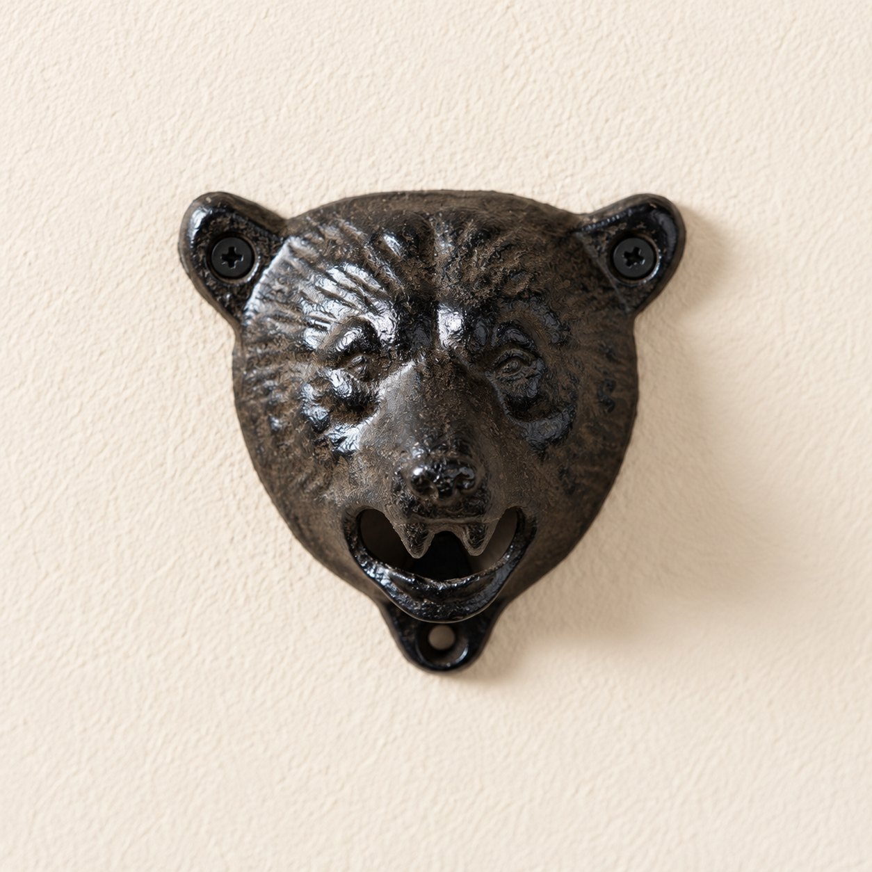 Bear opener mounted with both ear screws